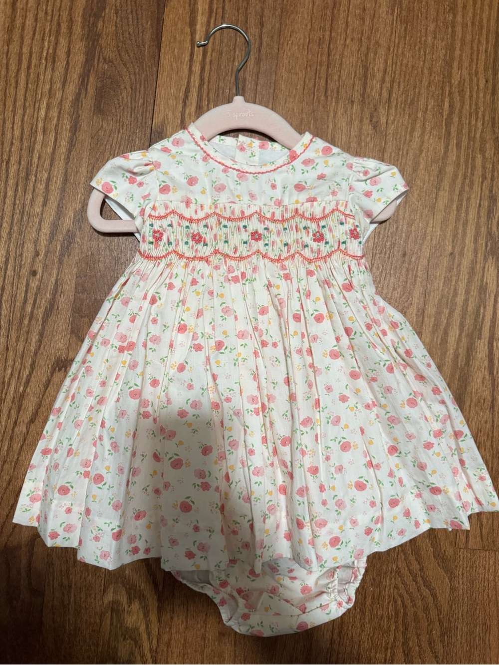 Antoinette Paris Smocked White Baby Dress with Pink Floral Print